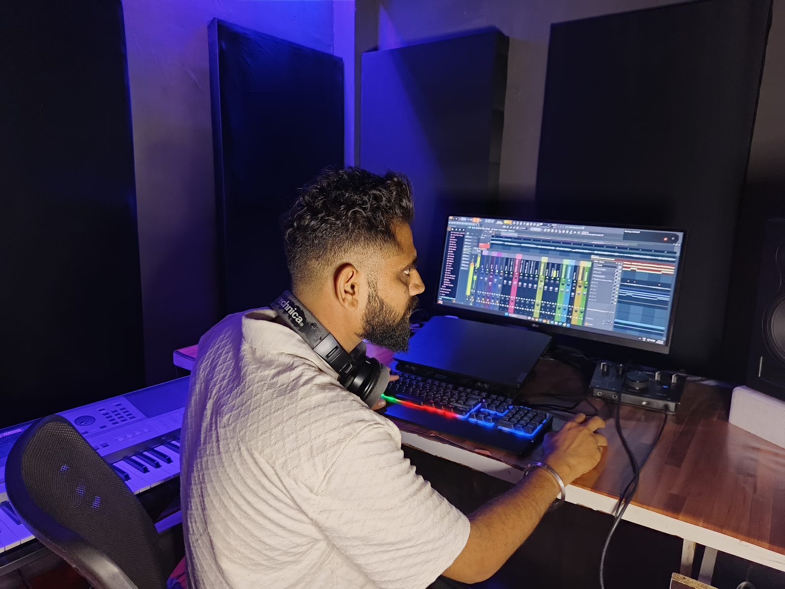 Ninja Singh working at the studio production desk
